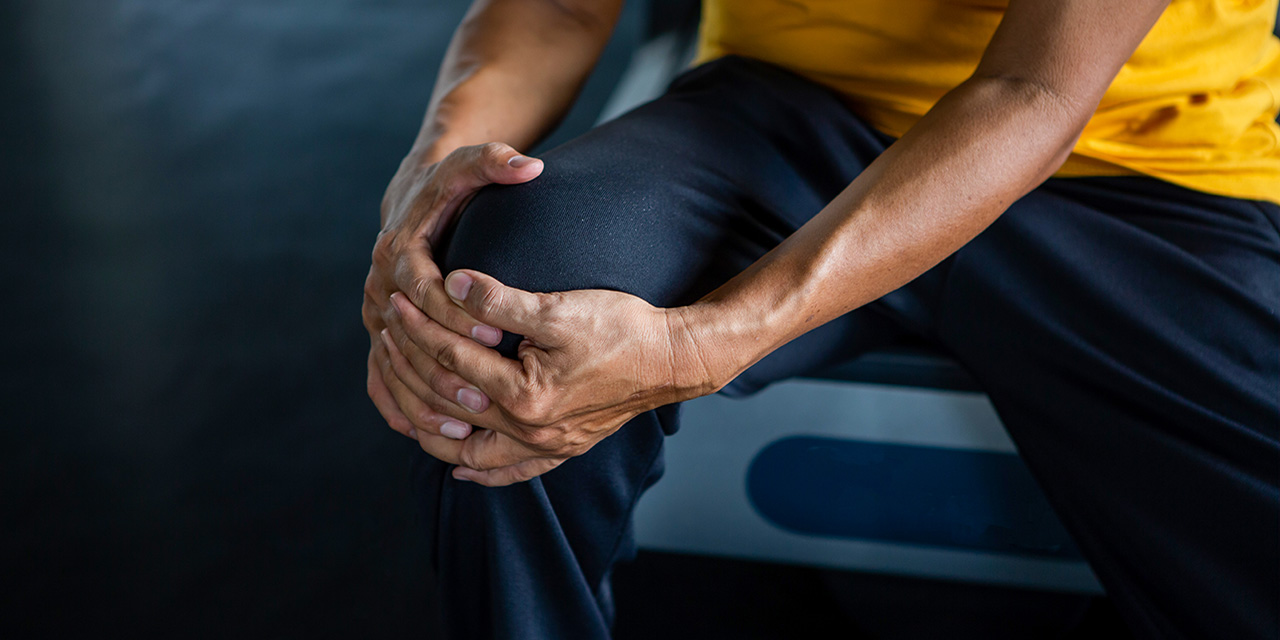 Senior asian sport man injury knee pain sitting on treadmill in fitness gym  . aged suffering from Arthritis elder male exercising , workout, training  ,healthy ,Retirement ,older, close up - Trinity Medical, WNY