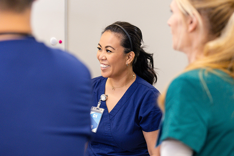Group of nurses smiling and laughing